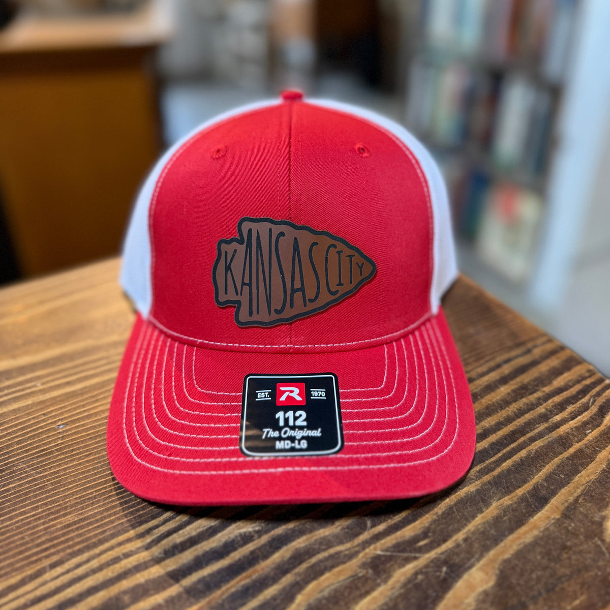 Red and white Kansas City arrowhead football hat with leatherette patch
